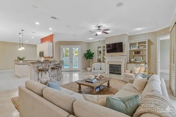 a view of a livingroom with furniture a fireplace
