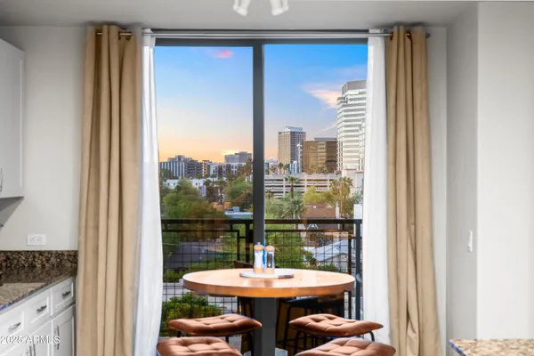 a kitchen with cabinets appliances and a sink