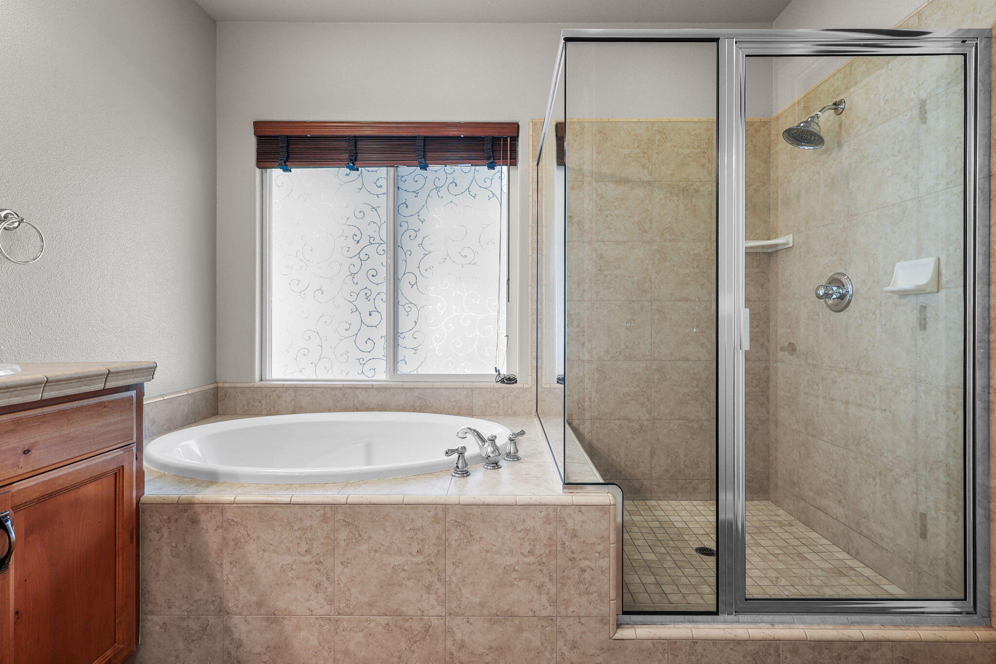 3641 Deuce Way Redding, CA 96002 - Photo 15 of 31 a bathroom with a bathtub and a shower