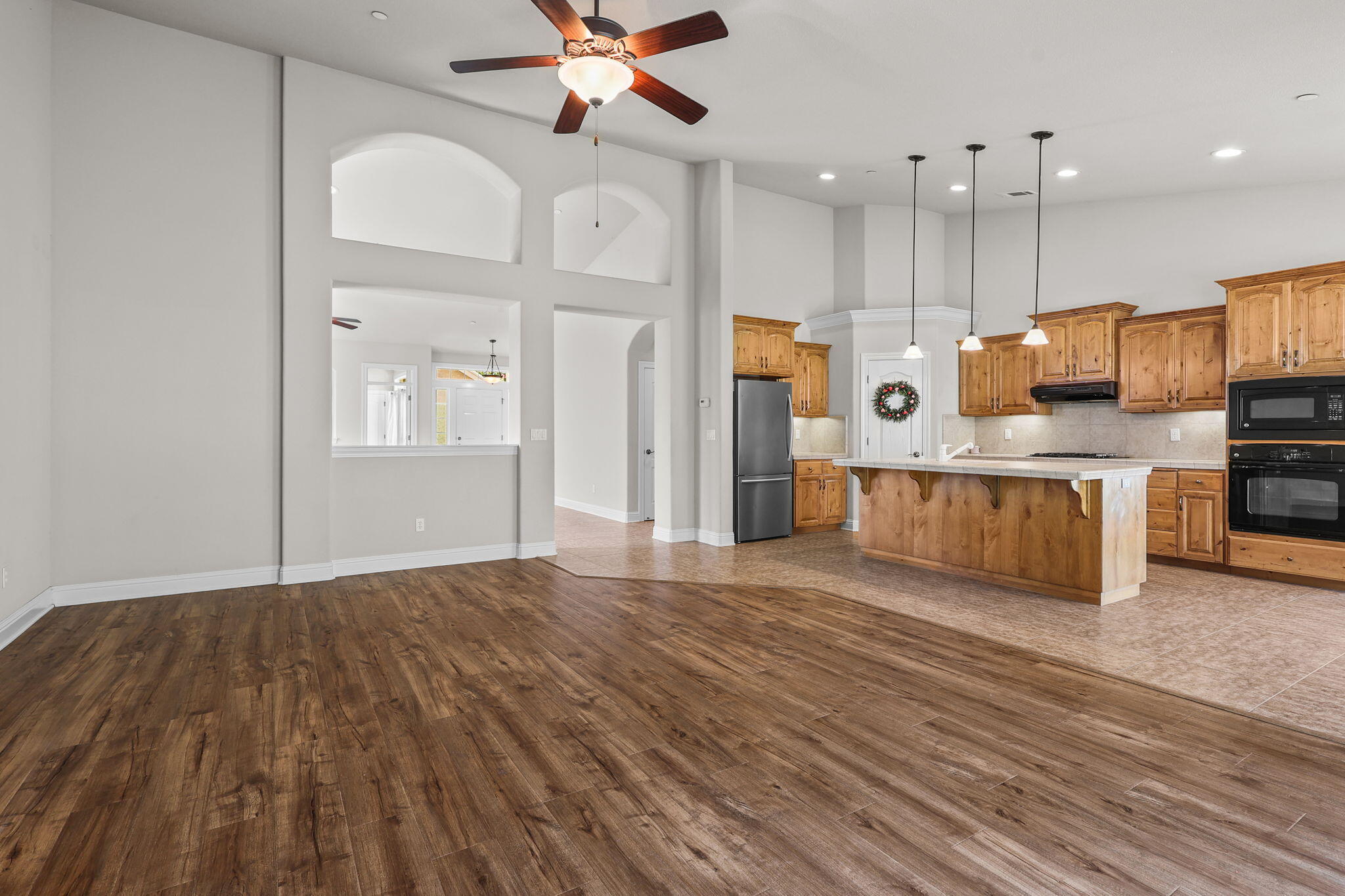 3641 Deuce Way Redding, CA 96002 - Photo 6 of 31 a view of kitchen with wooden floor and electronic appliances