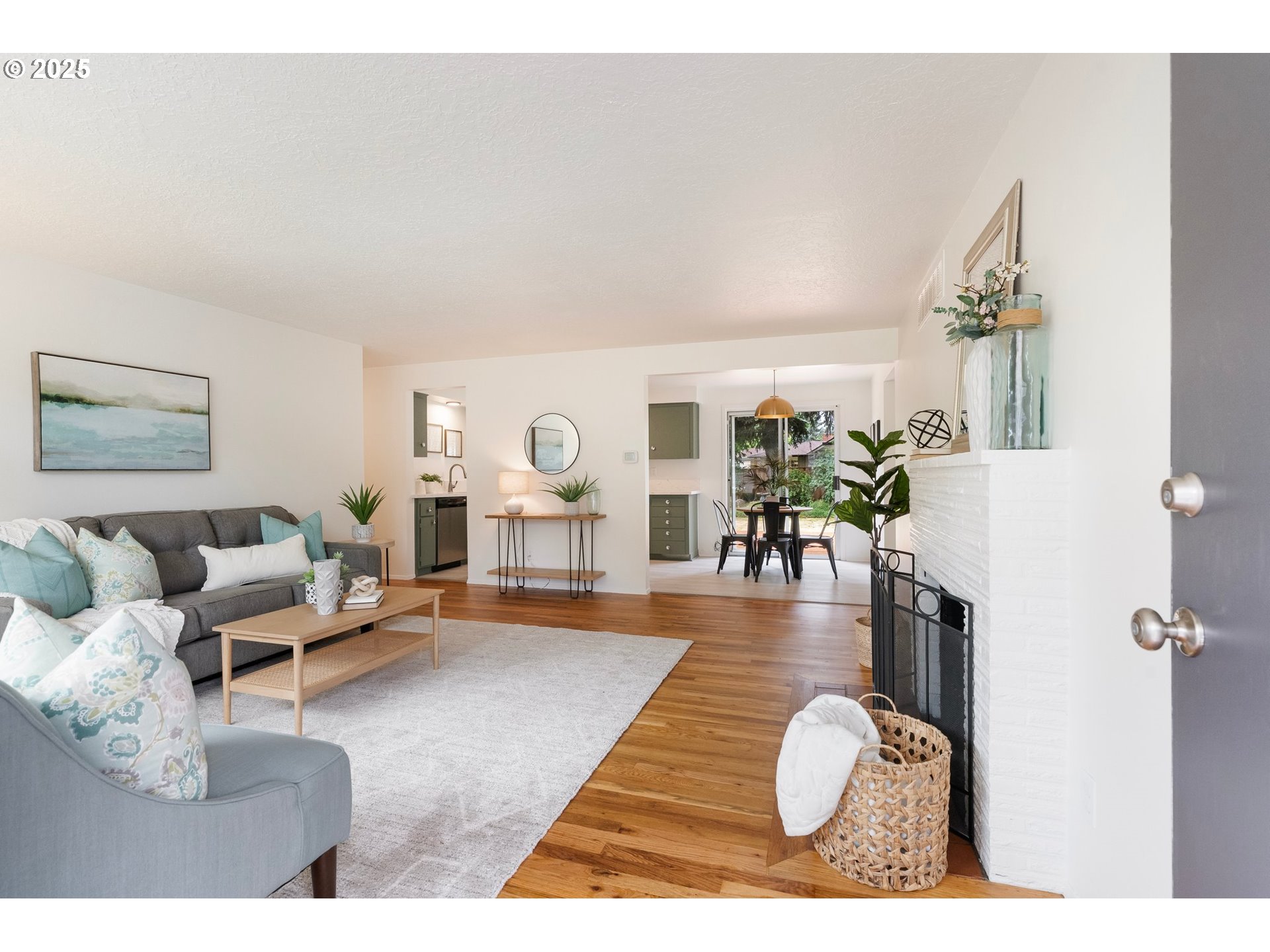 165 Northeast 167th Place Portland, OR 97230 - Photo 2 of 32 a living room with furniture and a table