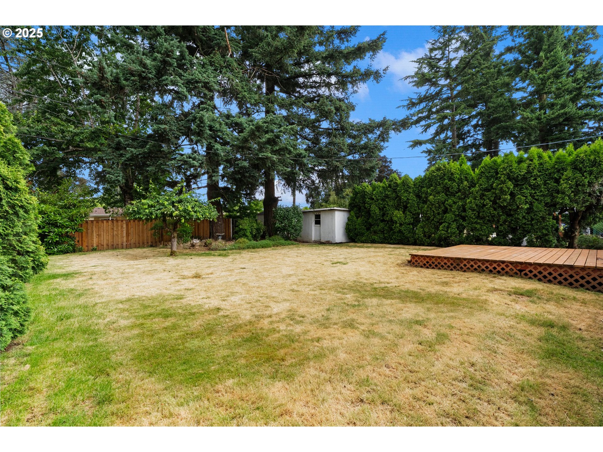 165 Northeast 167th Place Portland, OR 97230 - Photo 28 of 32 a view of yard with swimming pool and trees