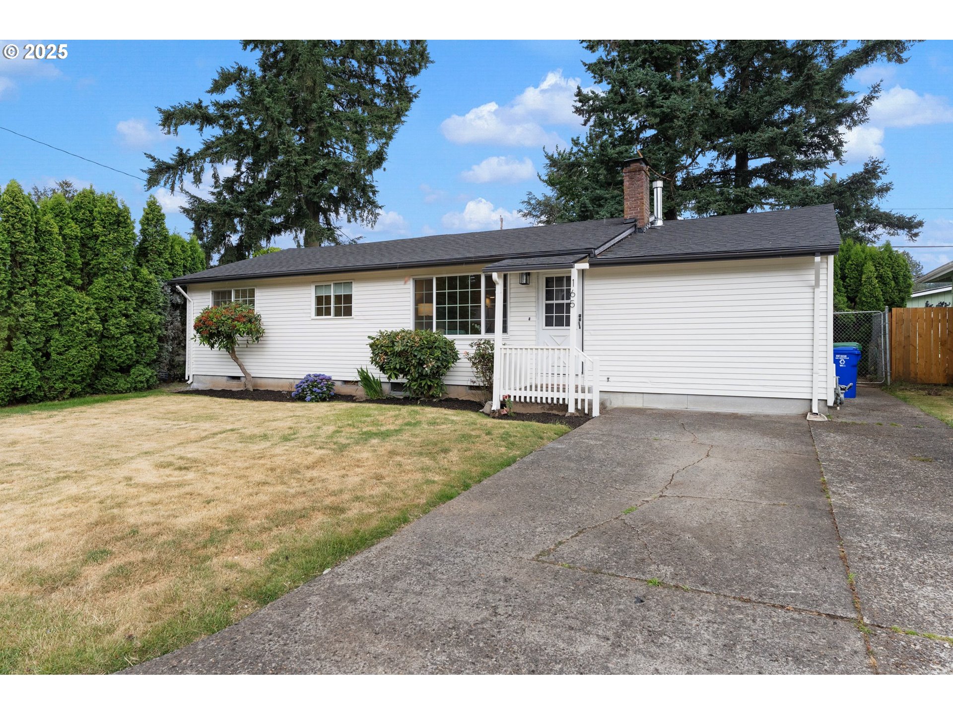 165 Northeast 167th Place Portland, OR 97230 - Photo 32 of 32 a view of a house with yard and garage