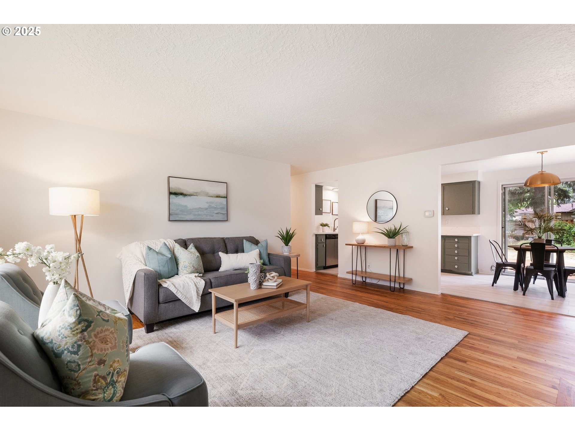 165 Northeast 167th Place Portland, OR 97230 - Photo 7 of 32 a living room with furniture and wooden floor