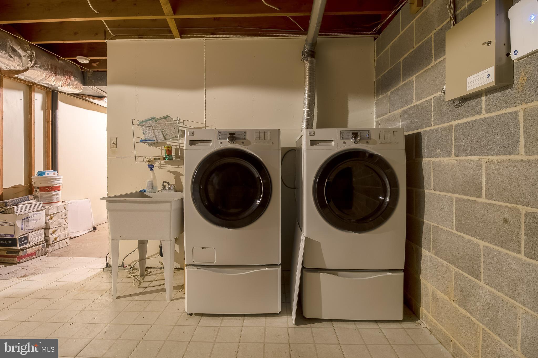 2344 Paddock Lane Reston, VA 20191 - Photo 22 of 30 Washing/Dryer in lower level with lots of storage