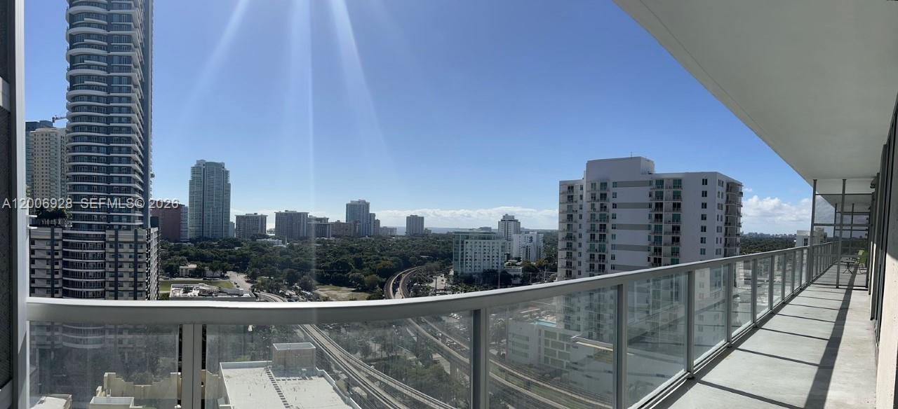 79 Southwest 12th Street, Unit 1903 Miami, FL 33130 - Photo 11 of 25 a view of a city from a balcony with city view