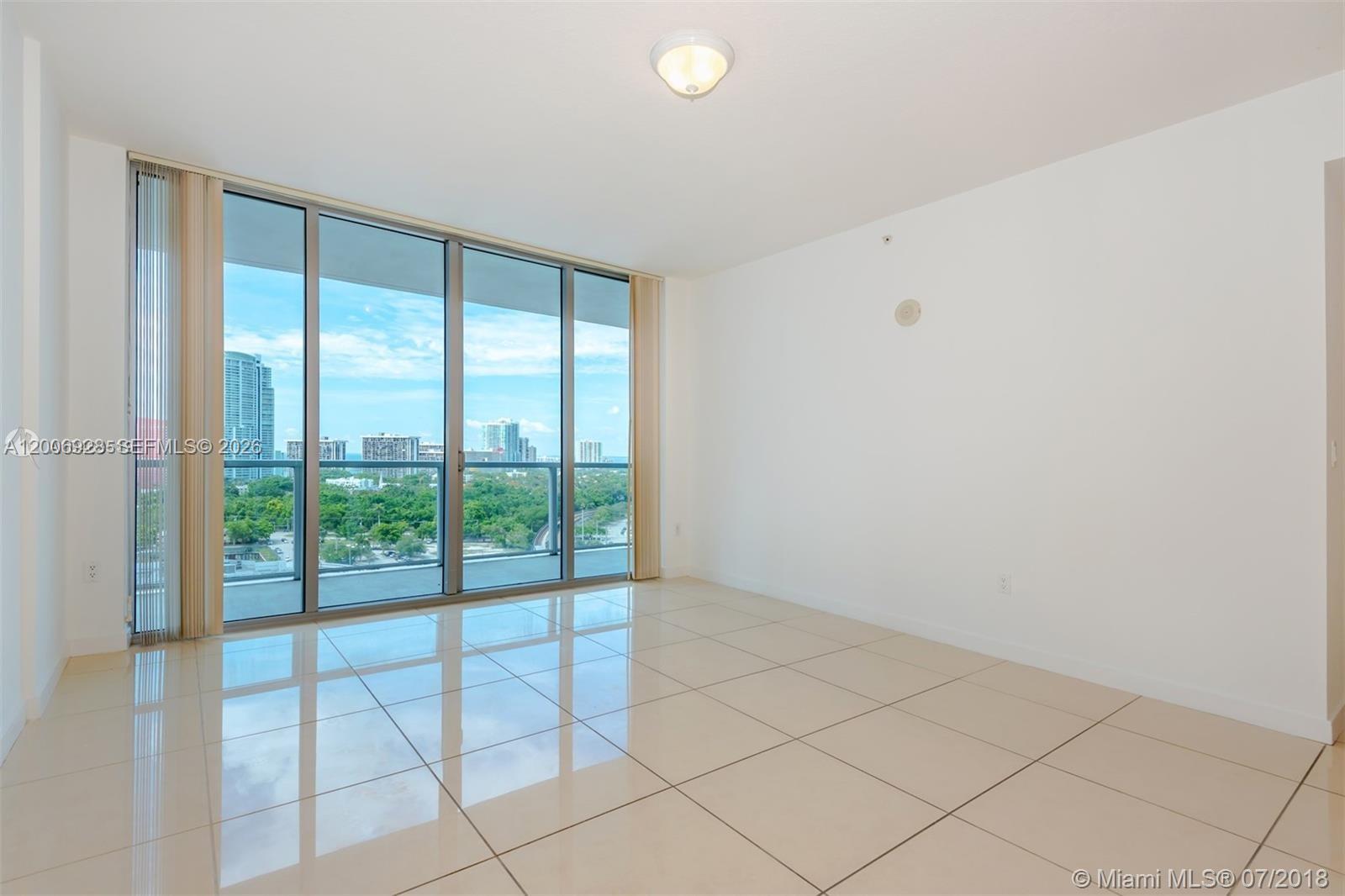 79 Southwest 12th Street, Unit 1903 Miami, FL 33130 - Photo 5 of 25 a view of an empty room and window