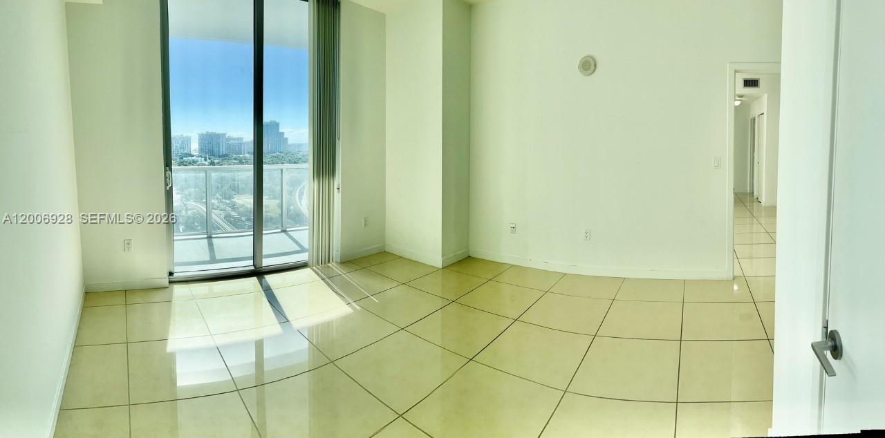 79 Southwest 12th Street, Unit 1903 Miami, FL 33130 - Photo 9 of 25 a view of an empty room and window