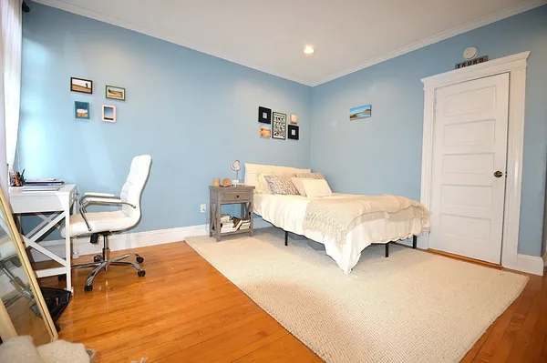 a bed room with a bed and a couch