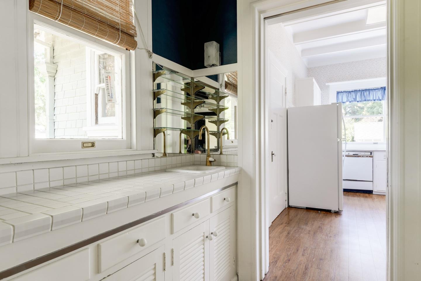 16 Maple Avenue Atherton, CA 94027 - Photo 12 of 25 a view of a sink and a mirror
