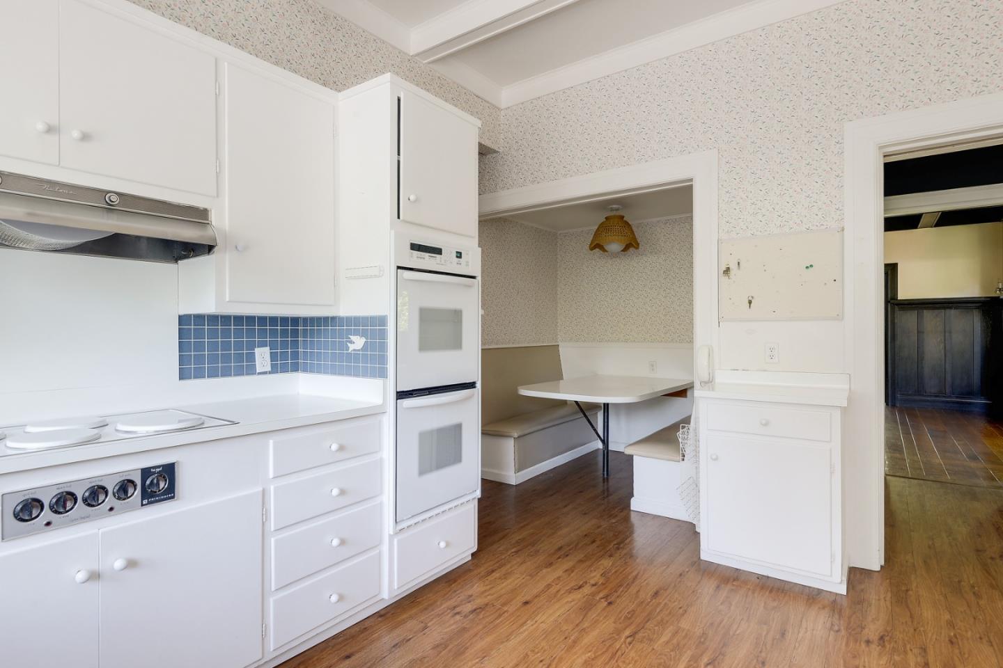 16 Maple Avenue Atherton, CA 94027 - Photo 13 of 25 a kitchen with white cabinets and appliances