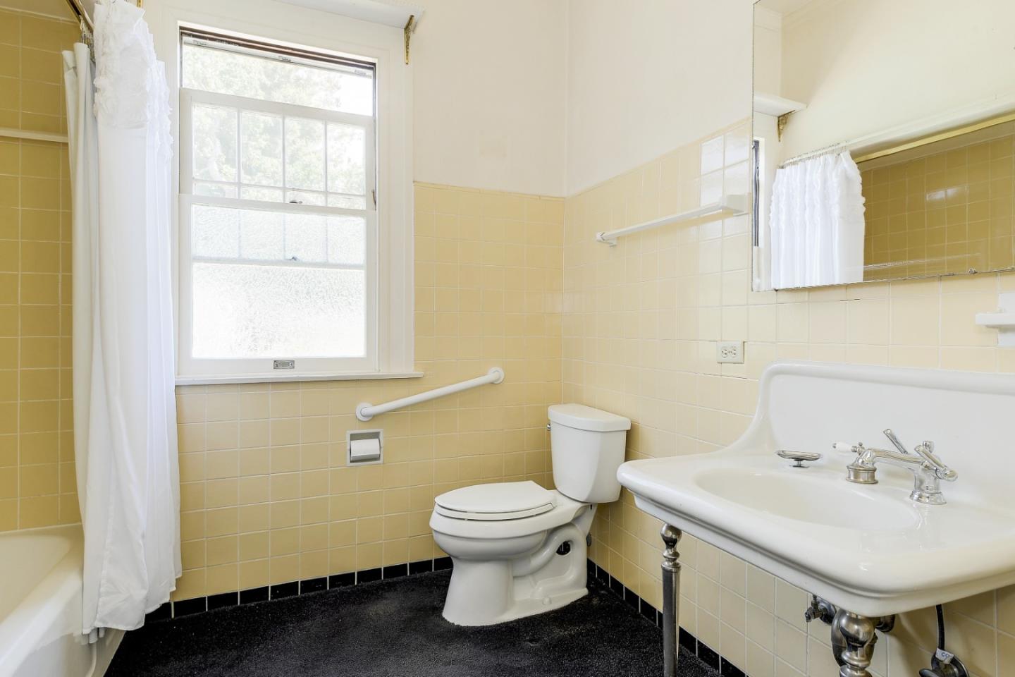16 Maple Avenue Atherton, CA 94027 - Photo 17 of 25 a bathroom with a sink a toilet and a mirror