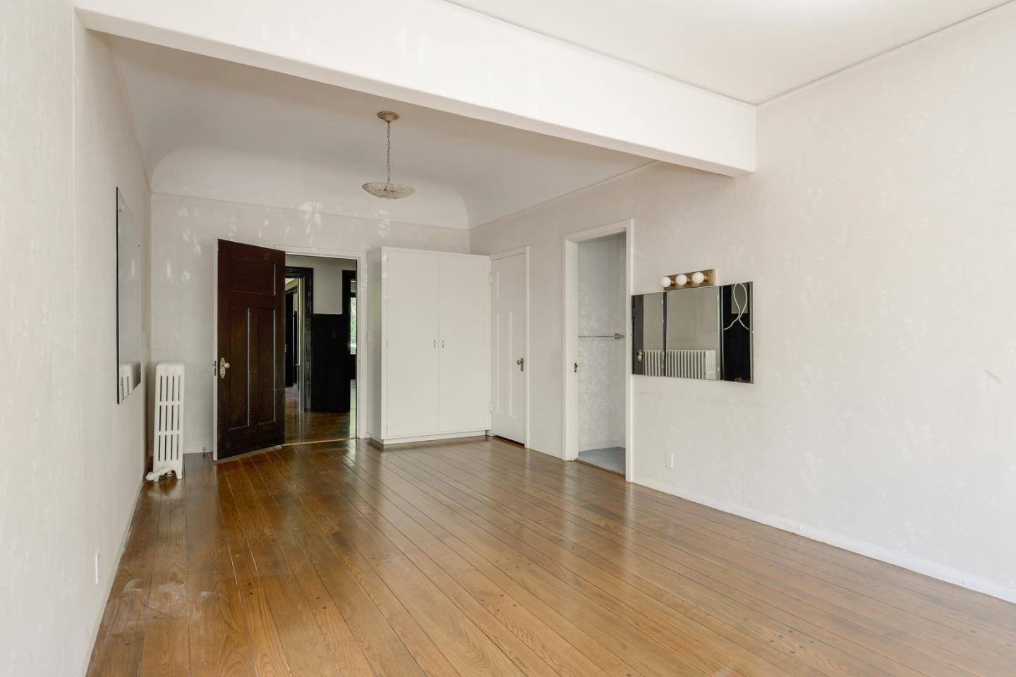 16 Maple Avenue Atherton, CA 94027 - Photo 21 of 25 a view of a hallway with wooden floor and closet