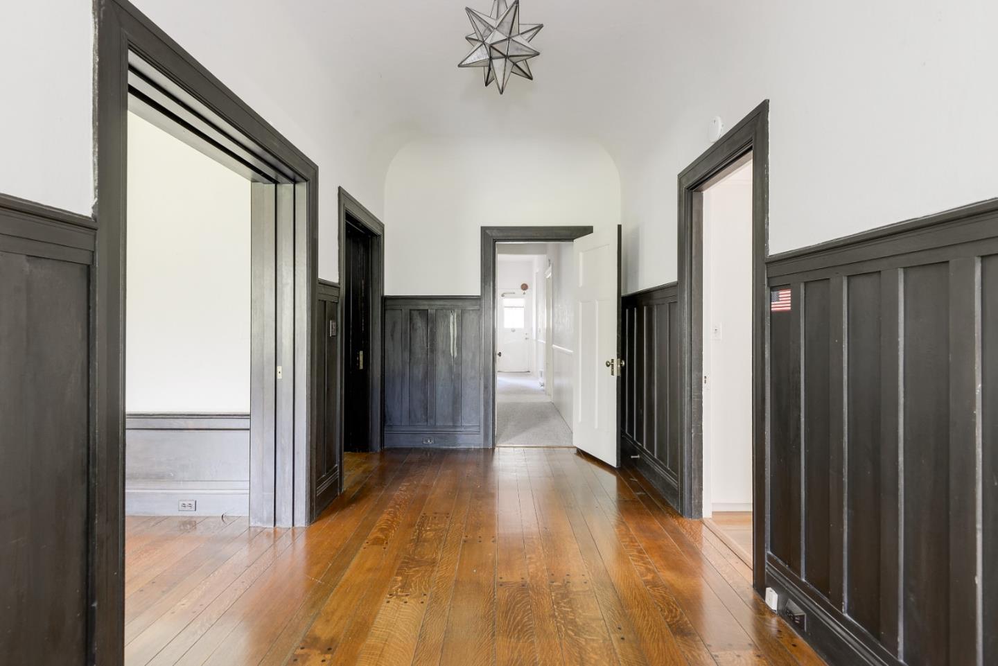 16 Maple Avenue Atherton, CA 94027 - Photo 10 of 25 a view of a hallway with wooden floor and a living room