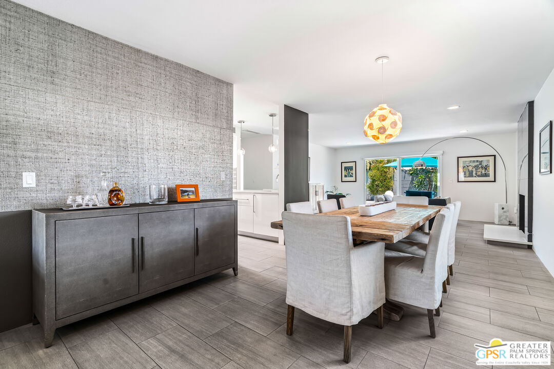 73428 Little Bend Trail Palm Desert, CA 92260 - Photo 12 of 46 a view of a dining room with furniture and a window