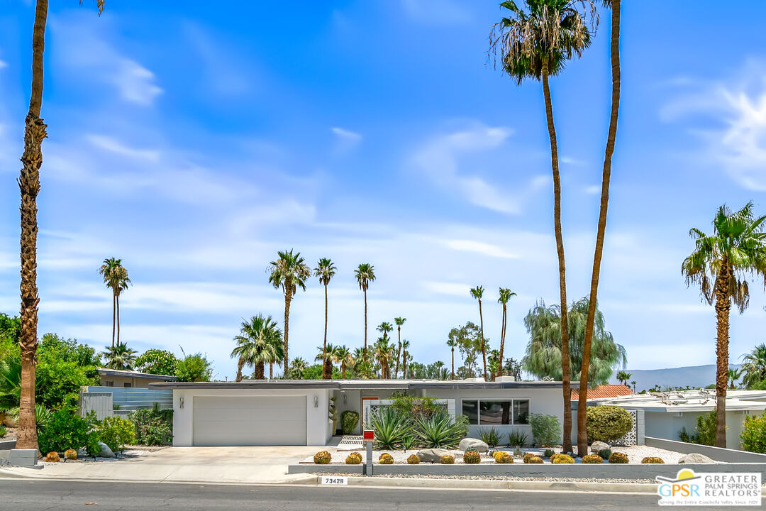 73428 Little Bend Trail Palm Desert, CA 92260 - Photo 2 of 46 a view of a city with tall buildings