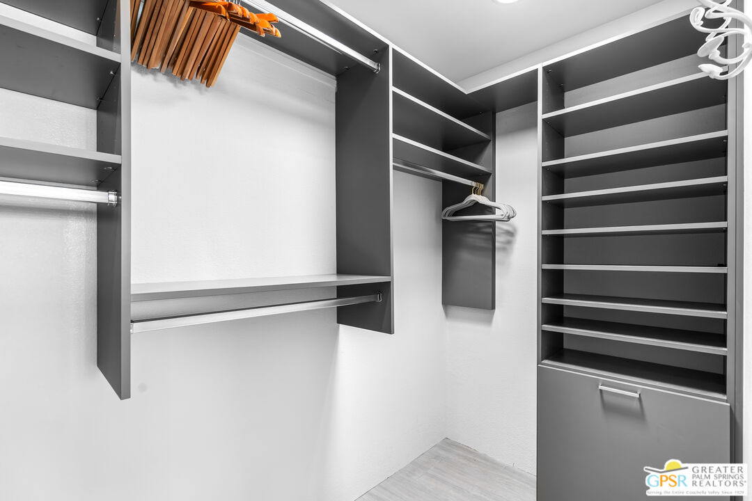 73428 Little Bend Trail Palm Desert, CA 92260 - Photo 29 of 46 a view of walk in closet with empty racks