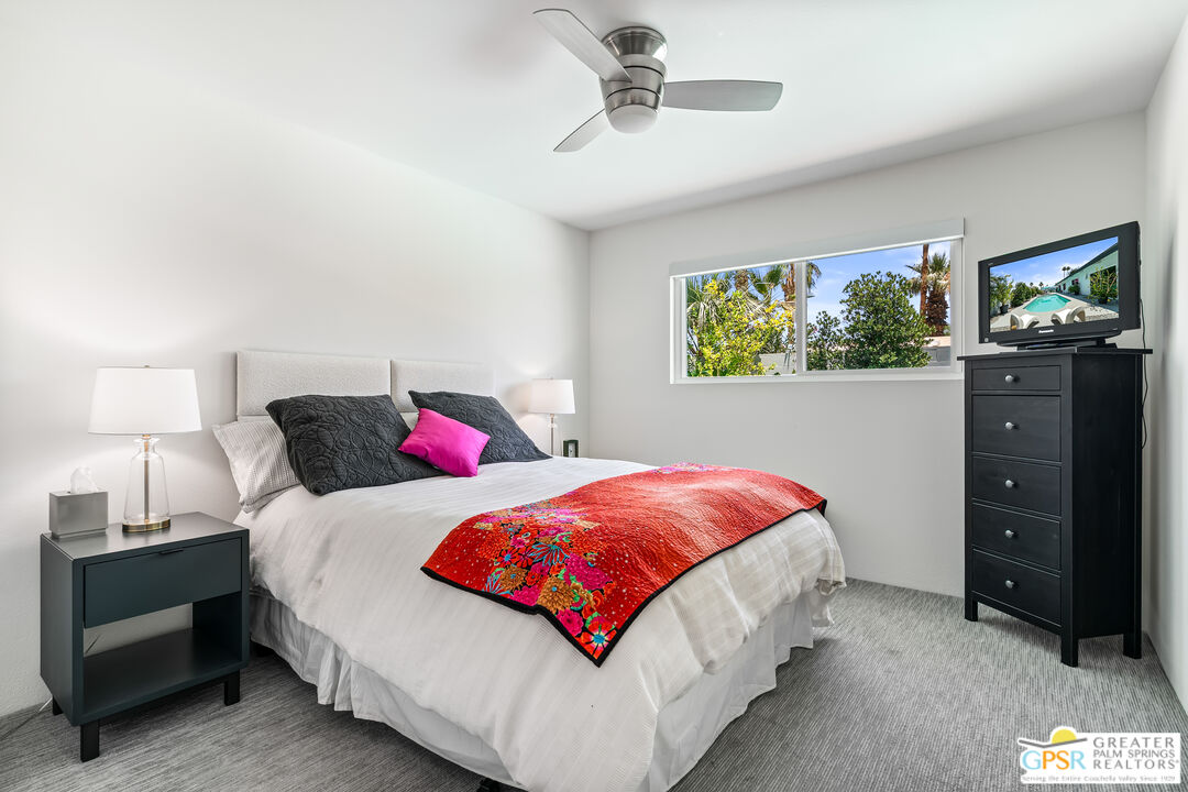 73428 Little Bend Trail Palm Desert, CA 92260 - Photo 30 of 46 a bedroom with two bed and a window