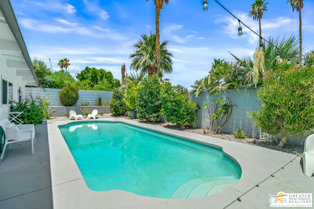 73428 Little Bend Trail Palm Desert, CA 92260 - Photo 37 of 46 a view of a swimming pool with an outdoor seating