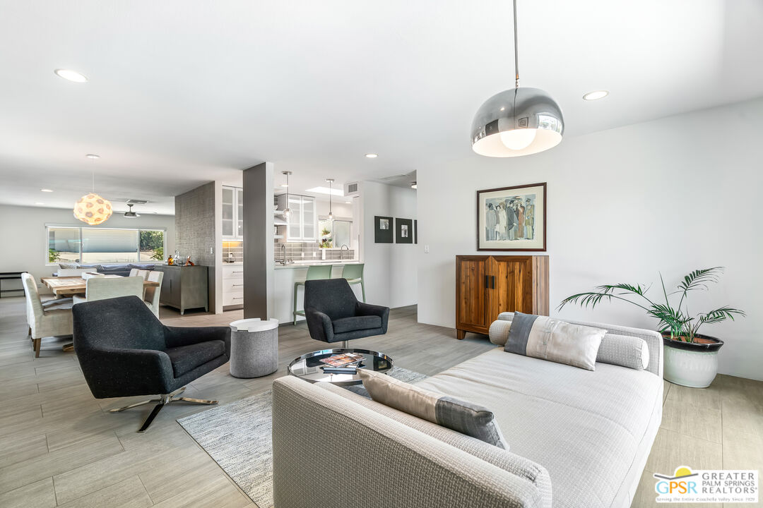 73428 Little Bend Trail Palm Desert, CA 92260 - Photo 9 of 46 a living room with furniture kitchen and a chandelier