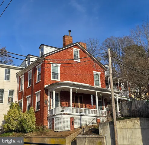 a front view of a house with glass windows
