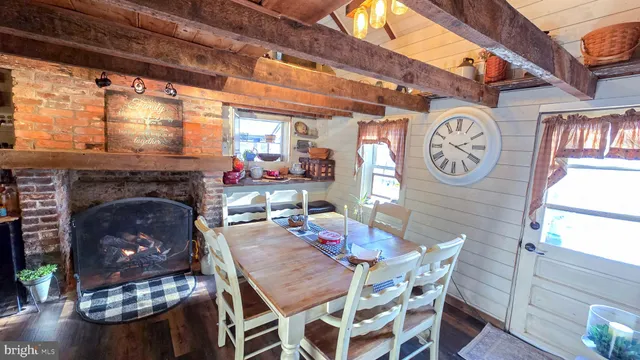 a view of a table and chairs in a patio