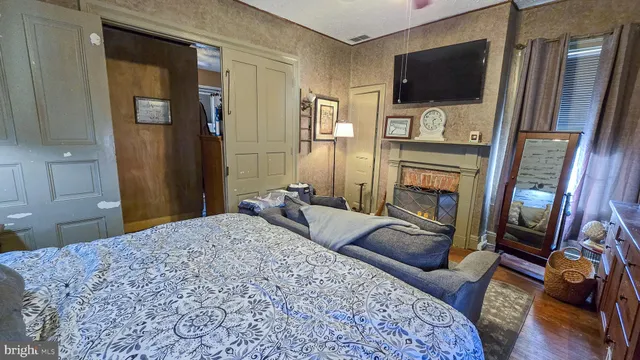 a room with furniture and wooden floor