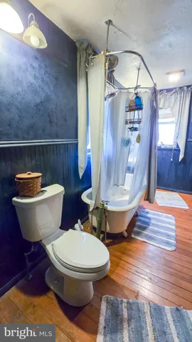 a view of a living room and dining room