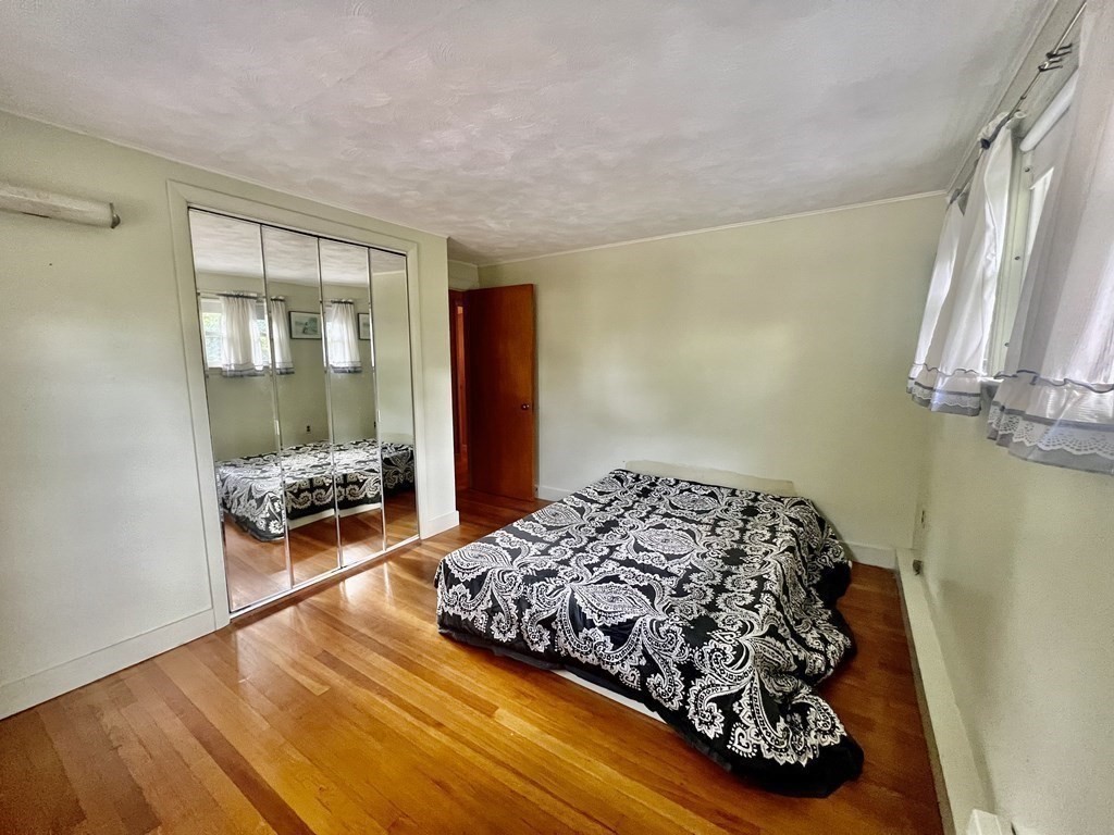11 Tower Road Ashland, MA 01721 - Photo 15 of 31 a bedroom with a bed and a window
