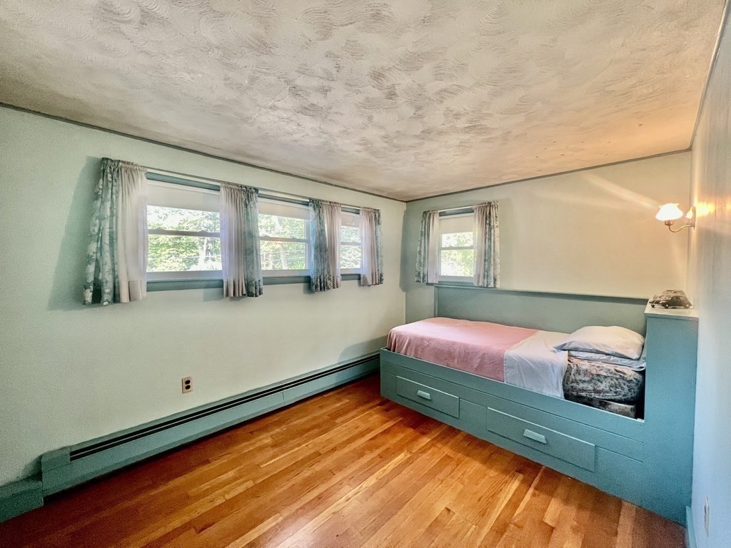 11 Tower Road Ashland, MA 01721 - Photo 17 of 31 a bedroom with a bed and window