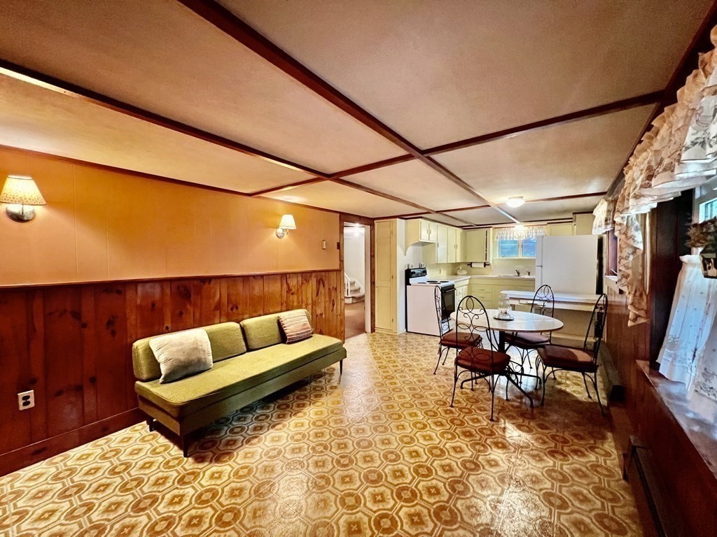 11 Tower Road Ashland, MA 01721 - Photo 22 of 31 a living room with furniture and a rug