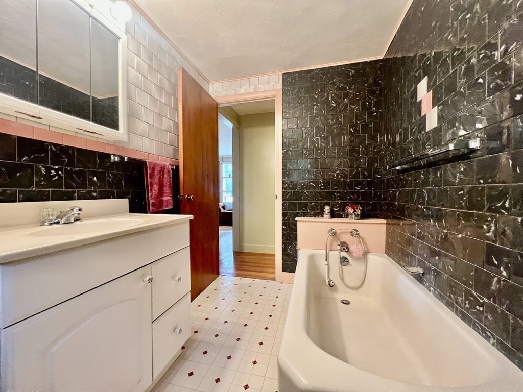 11 Tower Road Ashland, MA 01721 - Photo 24 of 31 a bathroom with a sink a toilet and shower