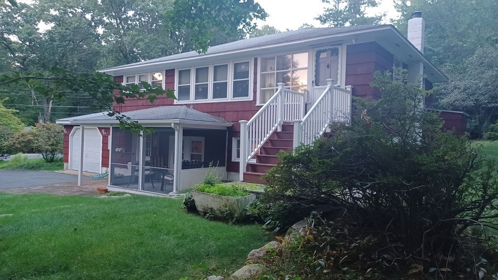 11 Tower Road Ashland, MA 01721 - Photo 31 of 31 a view of a house with a yard and potted plants