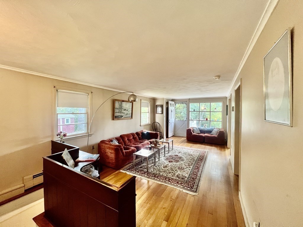 11 Tower Road Ashland, MA 01721 - Photo 8 of 31 a living room with furniture and a large window