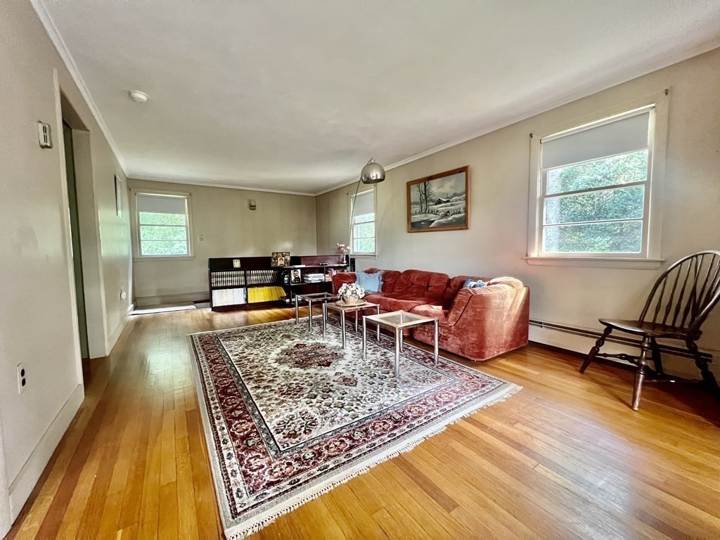11 Tower Road Ashland, MA 01721 - Photo 9 of 31 a living room with furniture and a rug