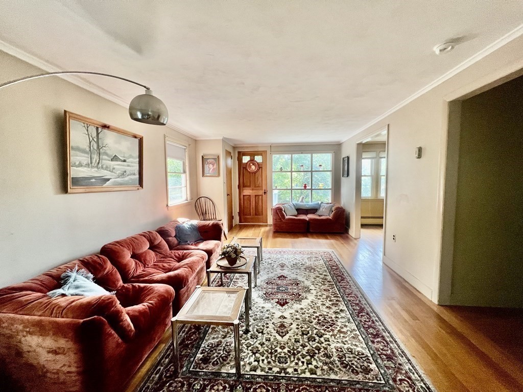 11 Tower Road Ashland, MA 01721 - Photo 10 of 31 a living room with furniture and a rug