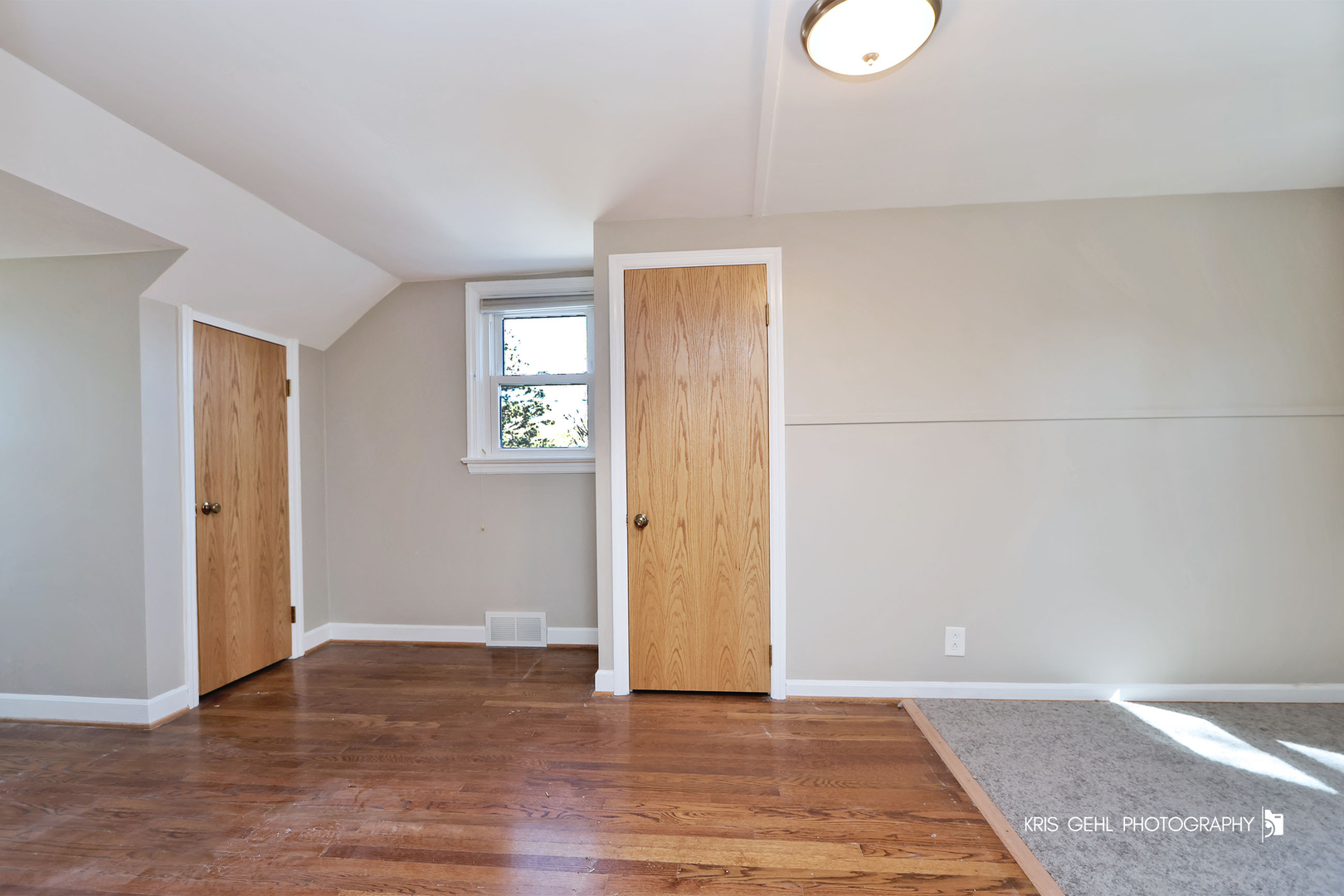275 Harding Street Grayslake, IL 60030 - Photo 15 of 25 an empty room with wooden floor and windows