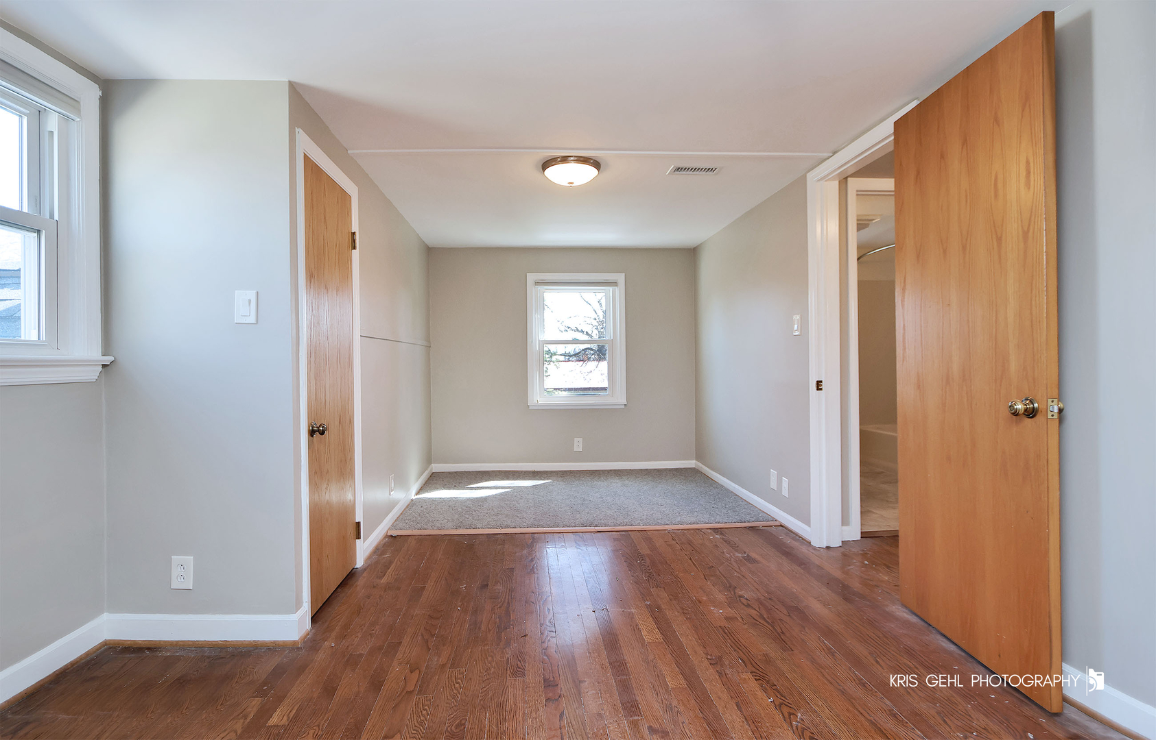 275 Harding Street Grayslake, IL 60030 - Photo 16 of 25 wooden floor in an empty room with a window