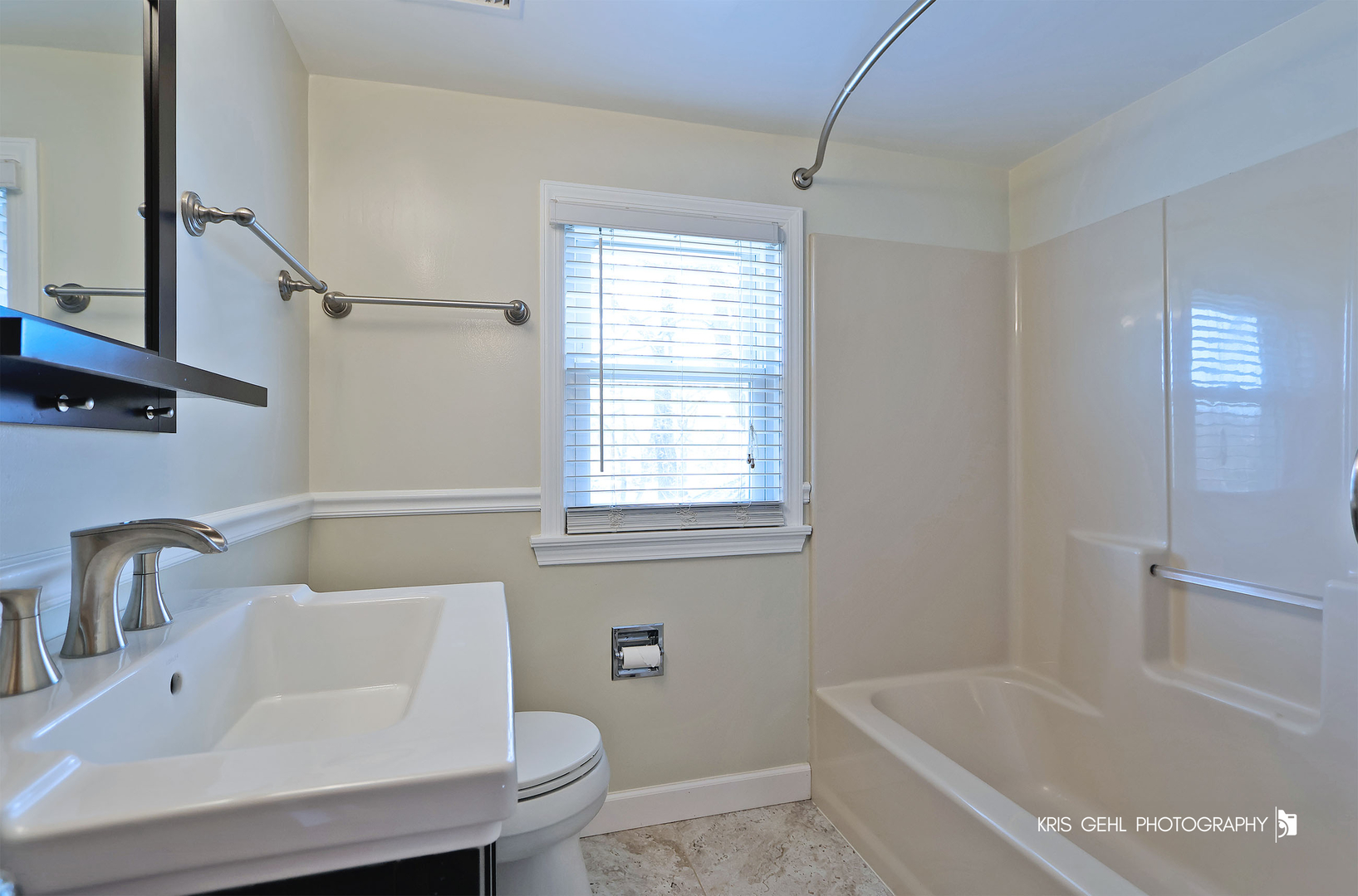 275 Harding Street Grayslake, IL 60030 - Photo 17 of 25 a white bath tub sitting next to a white sink