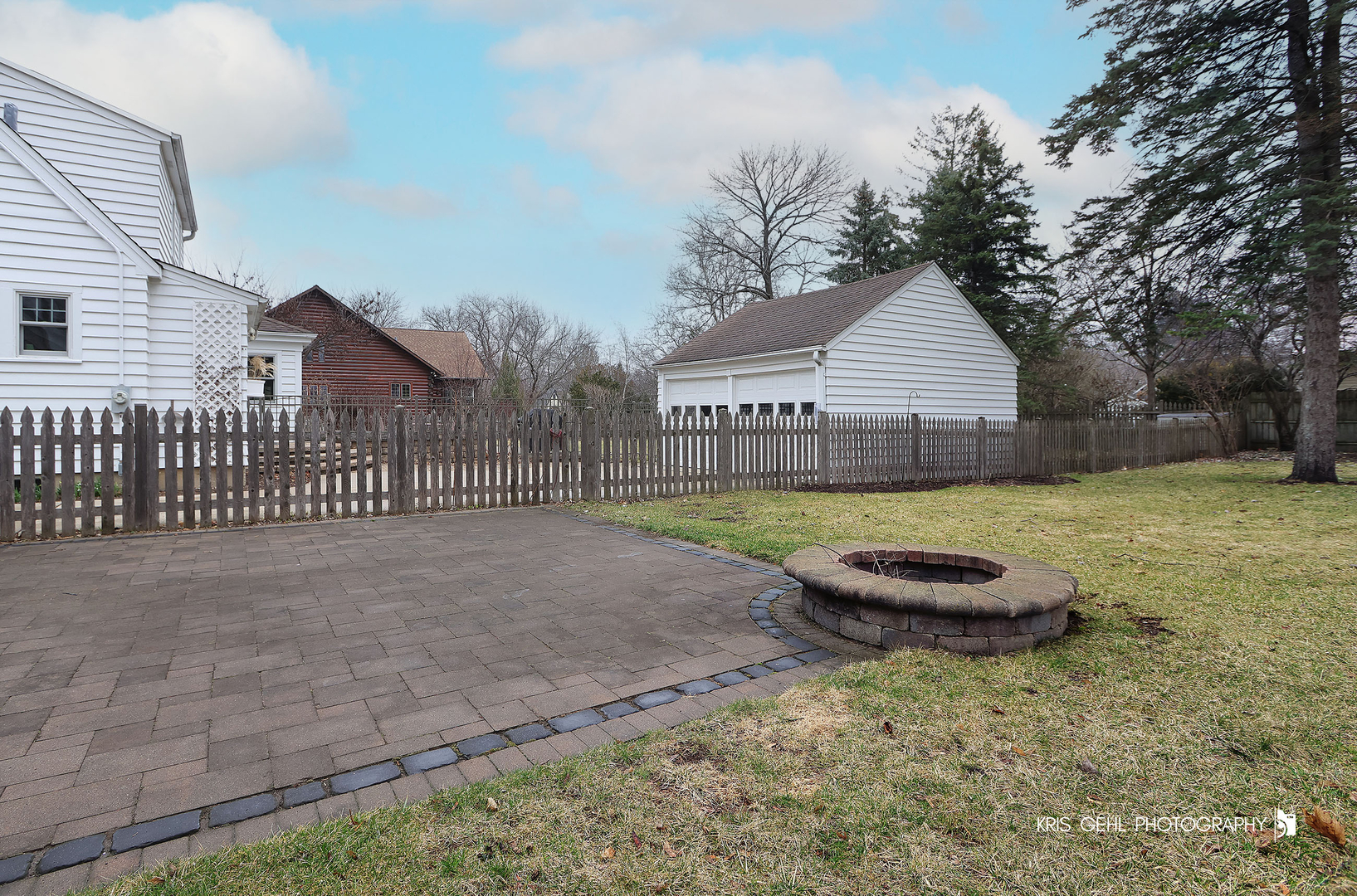 275 Harding Street Grayslake, IL 60030 - Photo 25 of 25 a view of a backyard with a trampoline
