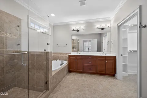 a bathroom with a sink vanity and a toilet