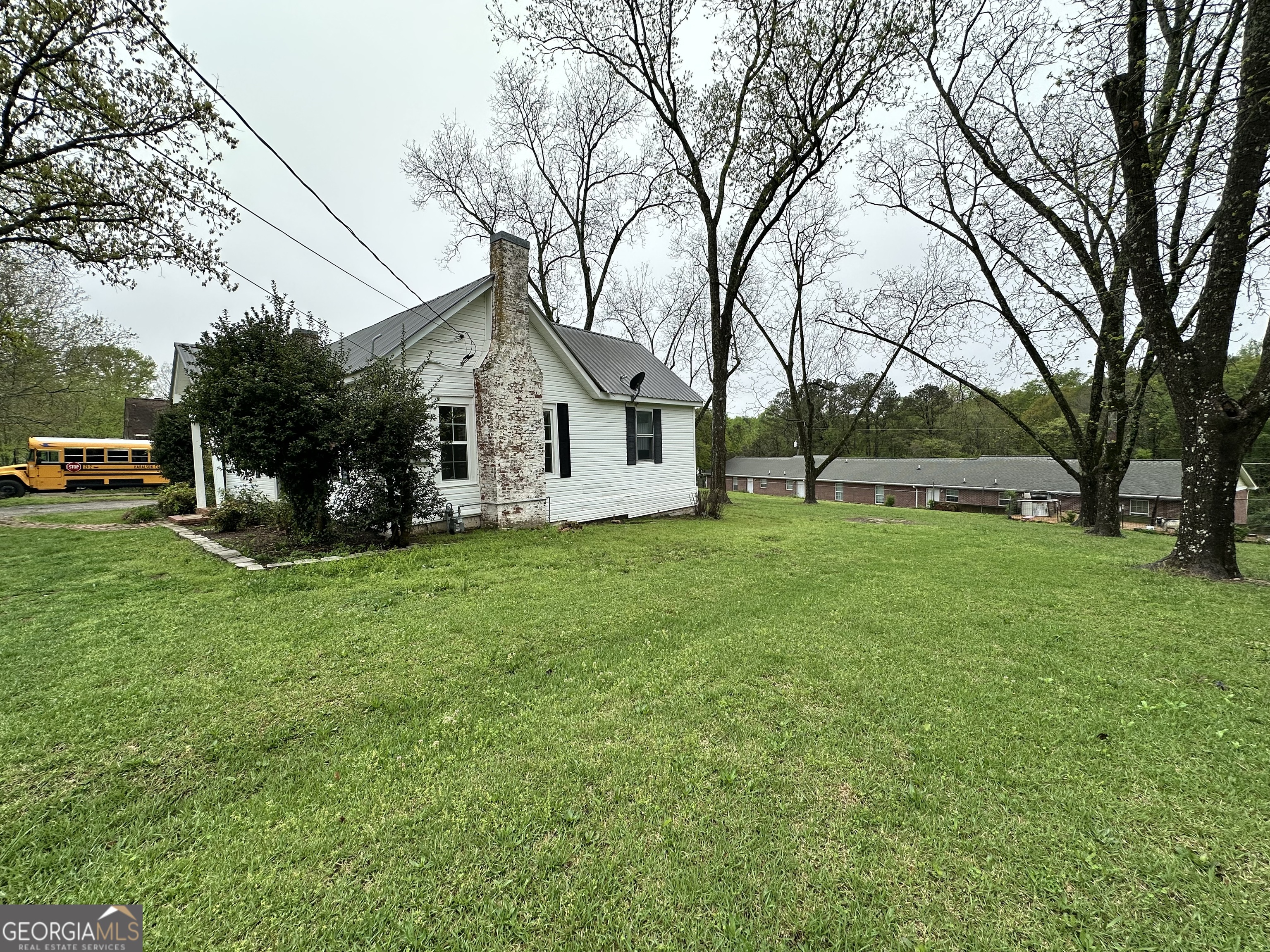 55 Bowdon Street Waco, GA 30182 - Photo 4 of 18 a front view of house with yard and green space
