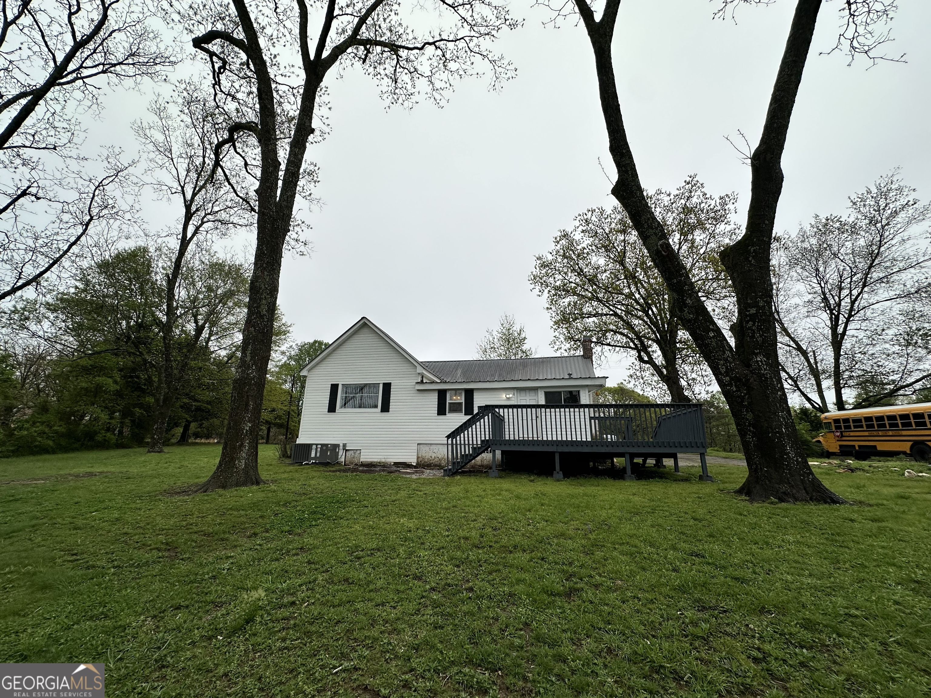55 Bowdon Street Waco, GA 30182 - Photo 5 of 18 a house view with a sitting space and garden