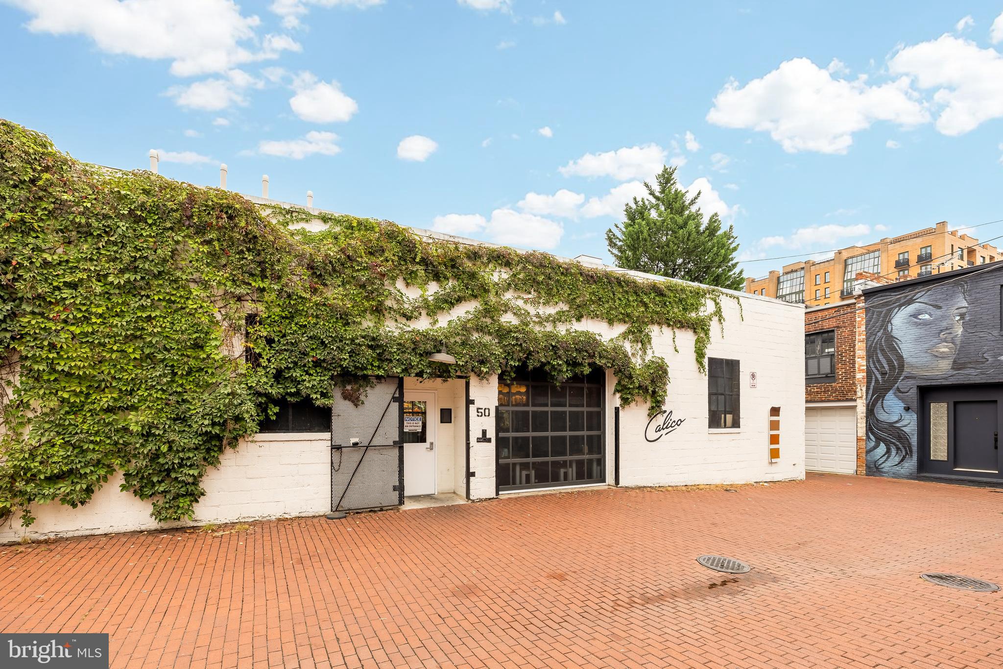 1314 10th Street Northwest Washington, DC 20001 - Photo 16 of 18 a view of a house with a backyard