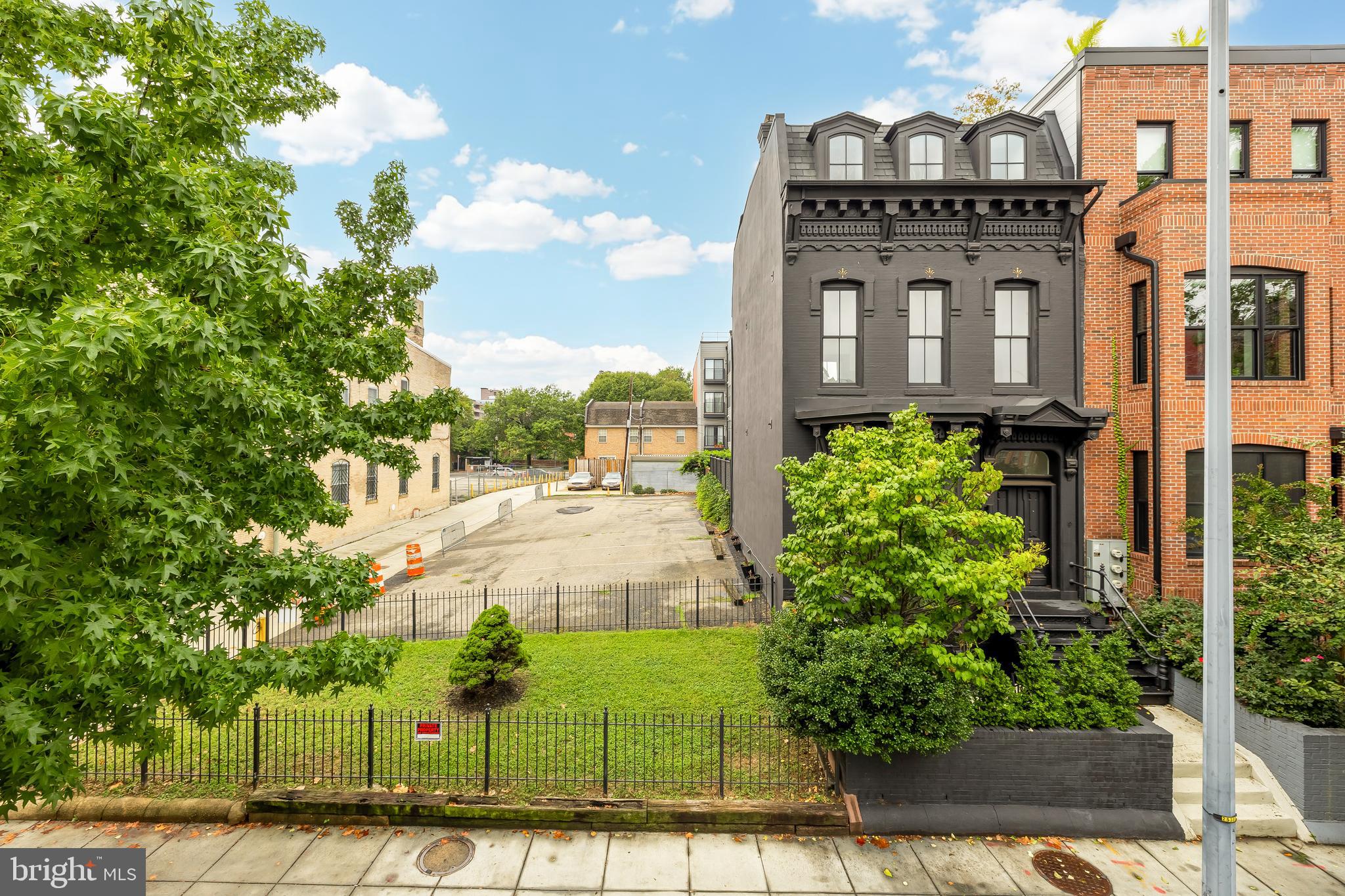 1314 10th Street Northwest Washington, DC 20001 - Photo 2 of 18 a front view of a building with garden