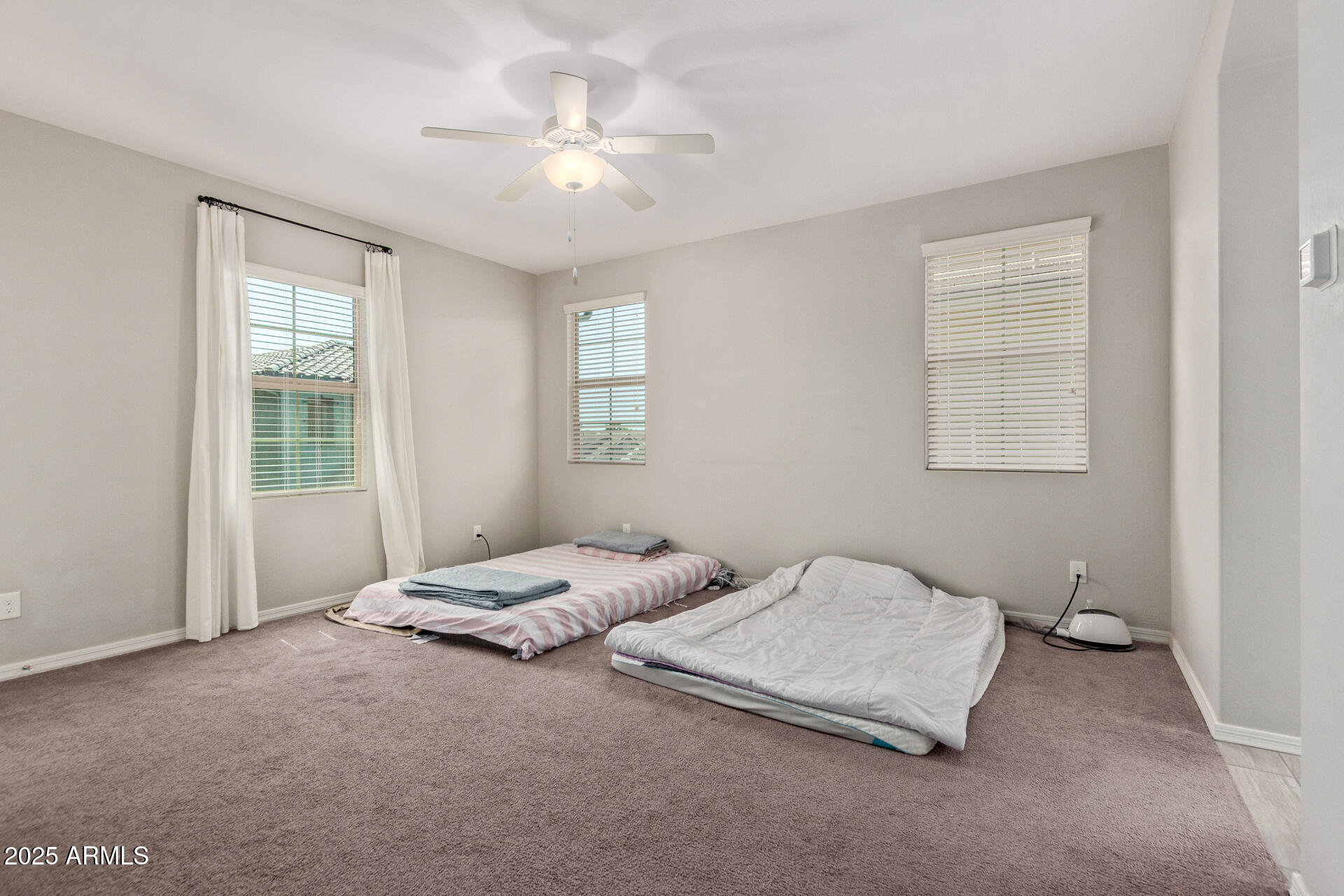 3934 East Turley Street Gilbert, AZ 85295 - Photo 13 of 37 a bedroom with a bed lamp and window