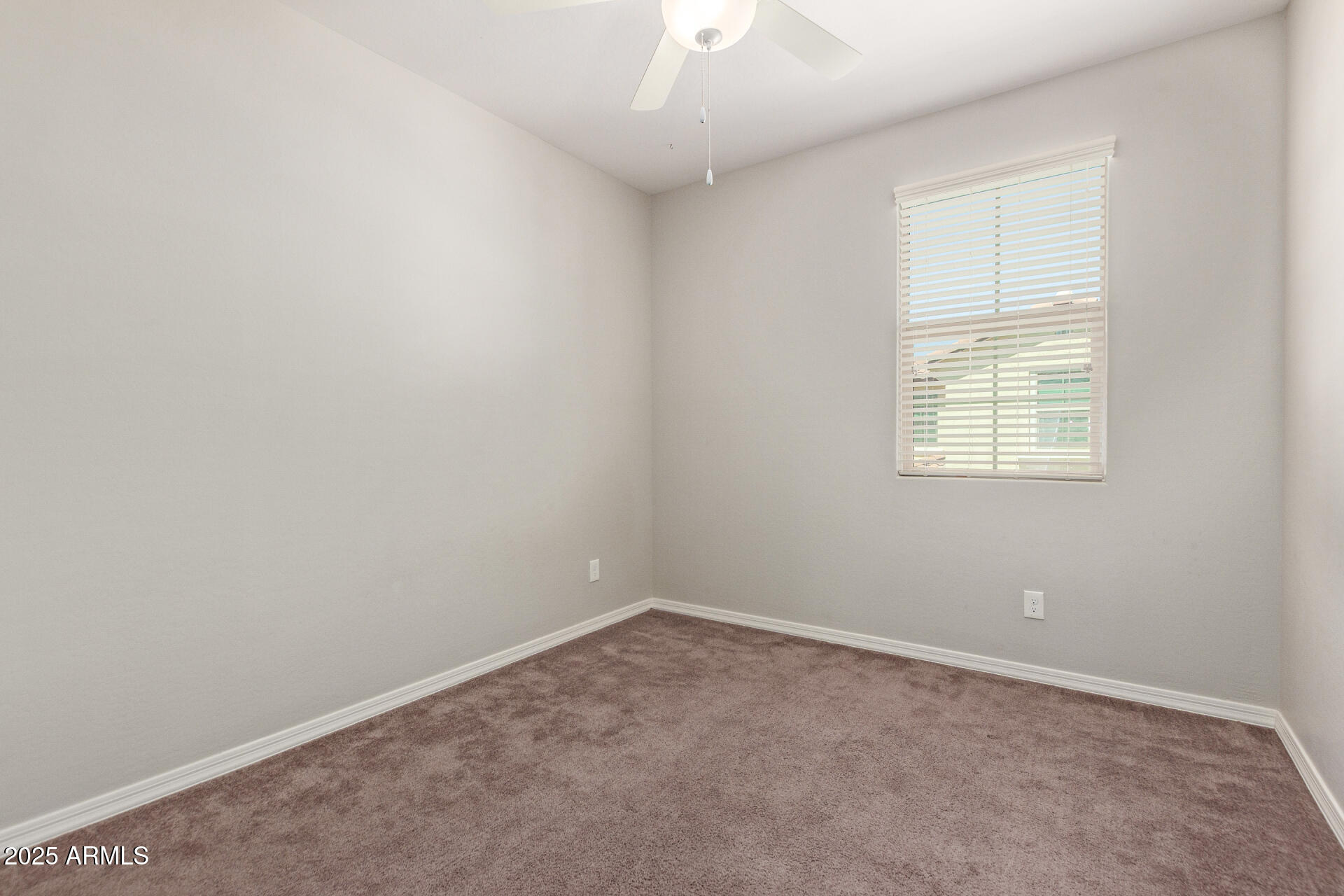3934 East Turley Street Gilbert, AZ 85295 - Photo 17 of 37 an empty room with windows