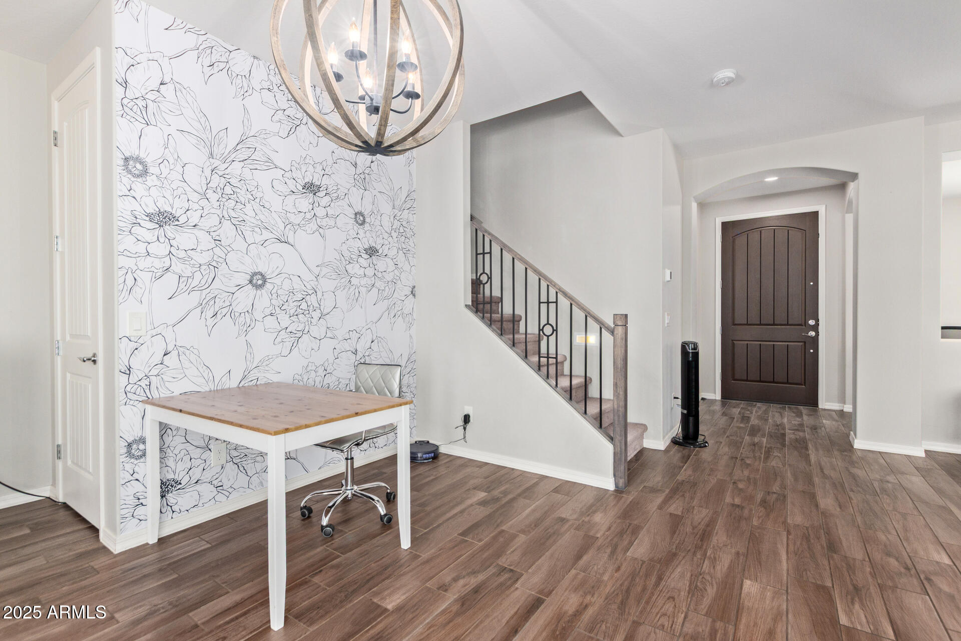 3934 East Turley Street Gilbert, AZ 85295 - Photo 3 of 37 a view of a hallway with wooden floor