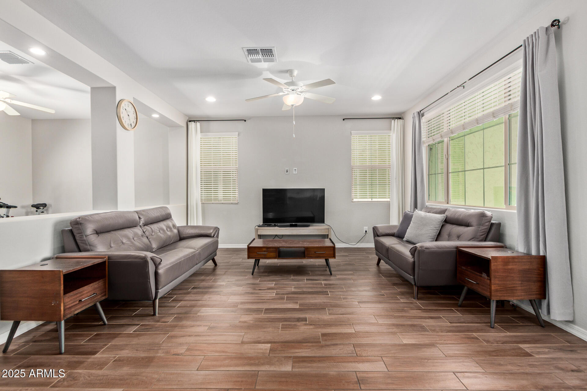 3934 East Turley Street Gilbert, AZ 85295 - Photo 6 of 37 a living room with furniture and a flat screen tv