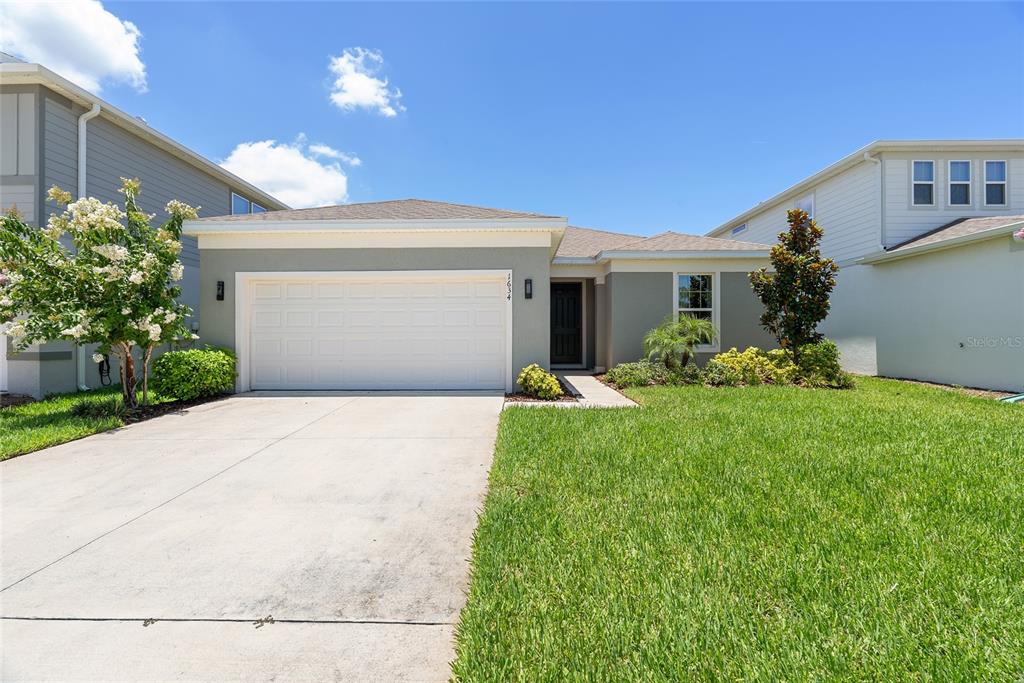 1634 Groveline Road St. Cloud, FL 34771 - Photo 43 of 43 a front view of house with yard